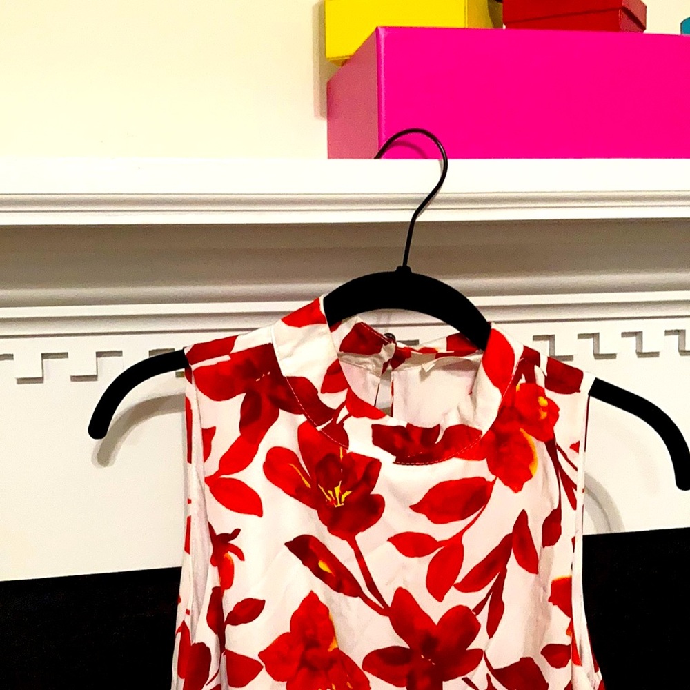 Women’s Peach Love California brand dress. Red and white floral design.